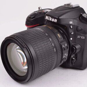Nikon D7100 plus 18-105mm len, battery & charger